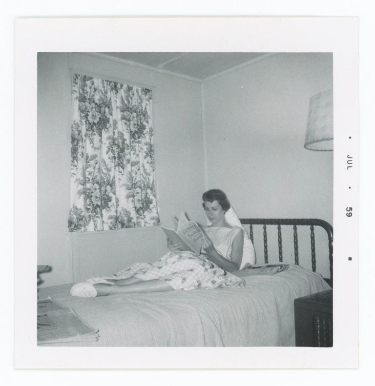Item #30678 Snapshot of a Woman Reading on A Bed. Anonymous.